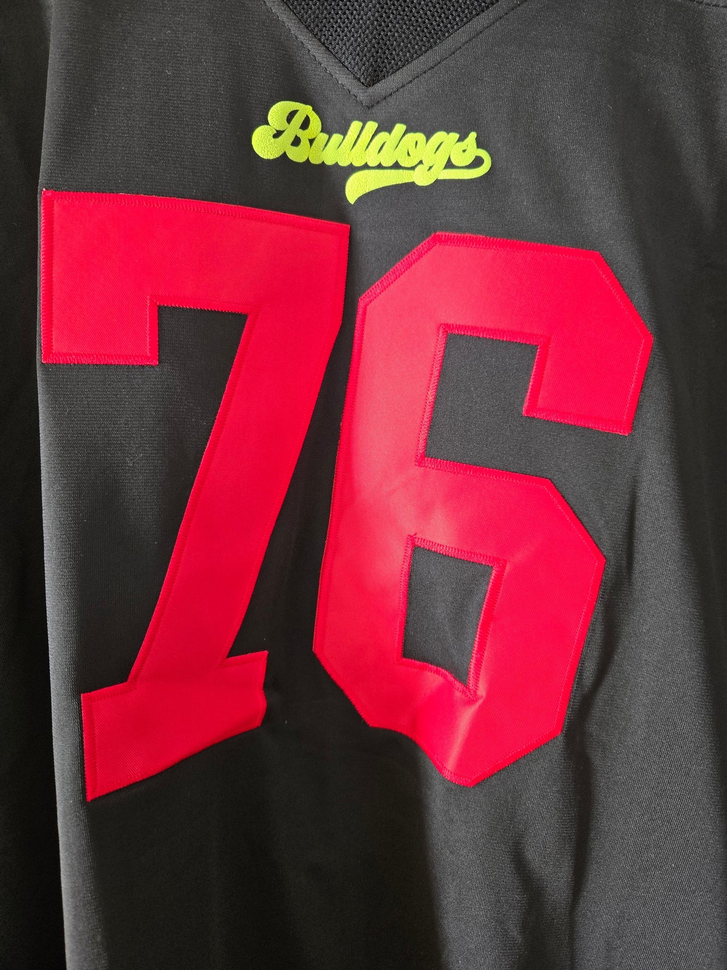 American Football Trikot Bulldogs Nummer 76 Oversize schwarz rot gelb